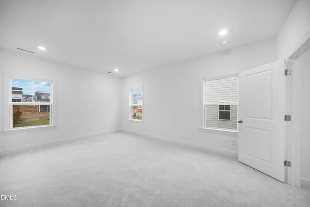 a bathroom with a sink toilet and a mirror