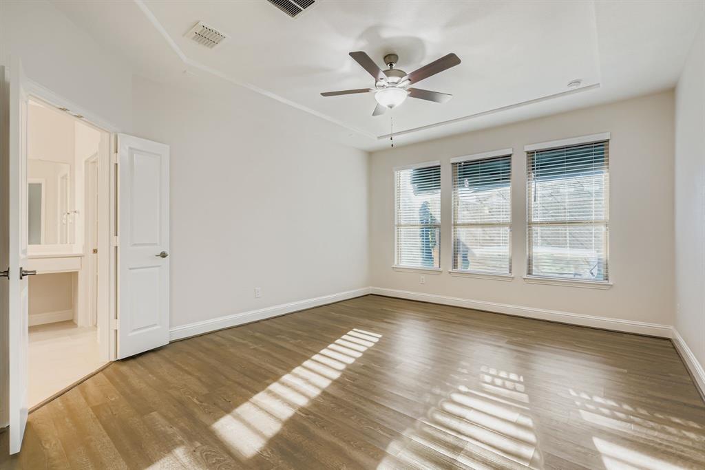 312 Magnolia Drive Oak Point, TX 75068 - Photo 12 of 28 Spare room with light wood-type flooring and a ceiling fan