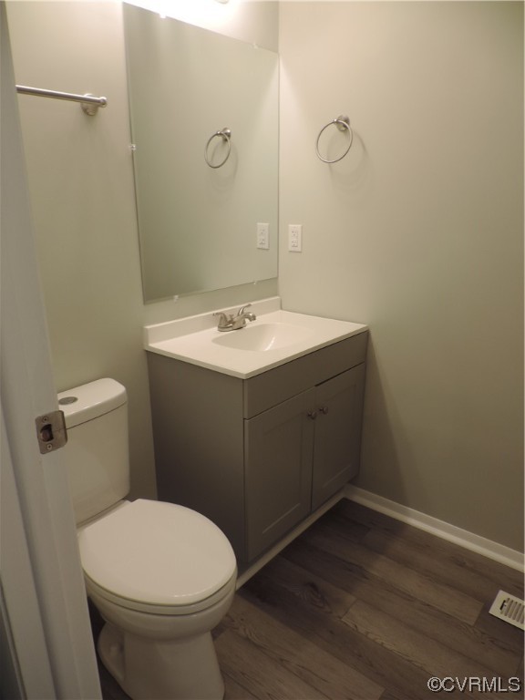 9316 Becar Road North Chesterfield, VA 23236 - Photo 11 of 32 a bathroom with a sink toilet and vanity