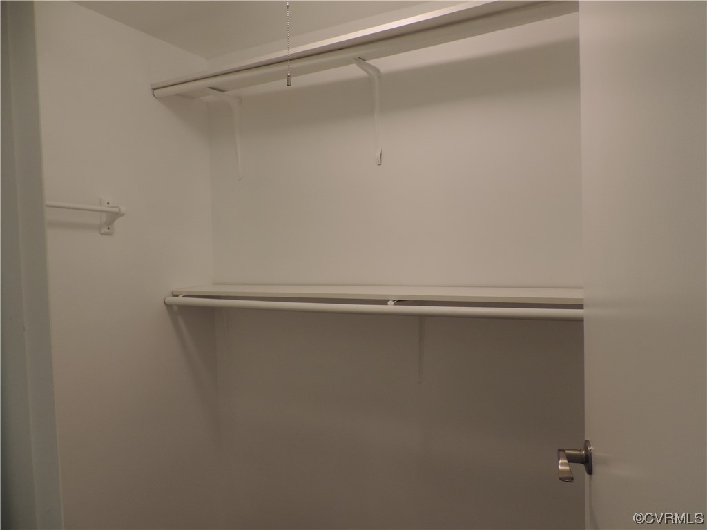9316 Becar Road North Chesterfield, VA 23236 - Photo 19 of 32 a view of a room with racks on the wall
