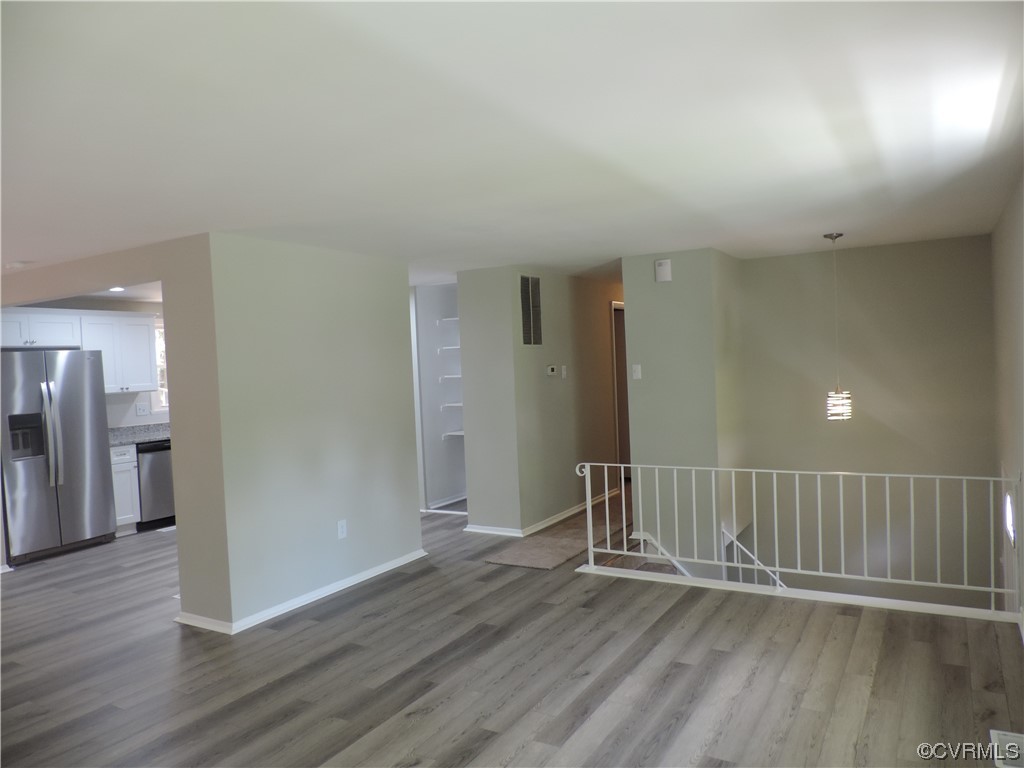9316 Becar Road North Chesterfield, VA 23236 - Photo 5 of 32 wooden floor in an empty room with wooden floor