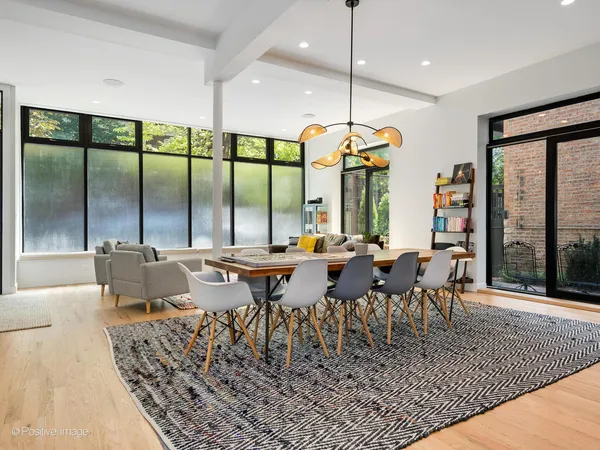 an outdoor dining space with furniture