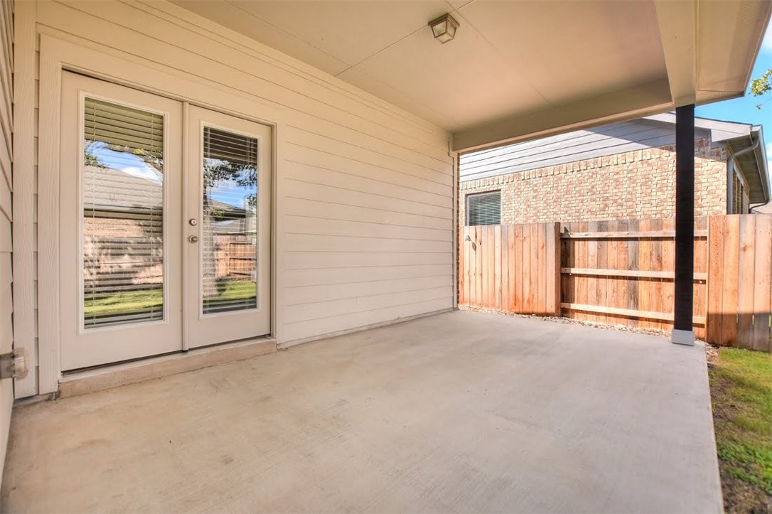 704 Bonnet Boulevard Georgetown, TX 78628 - Photo 26 of 40 Big covered porch for you evening barbecue.