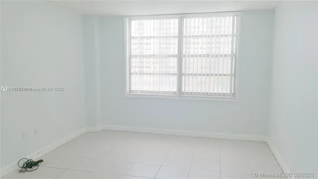 an empty room with a window