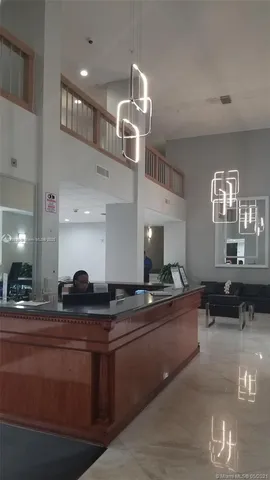 a kitchen with a sink and stove