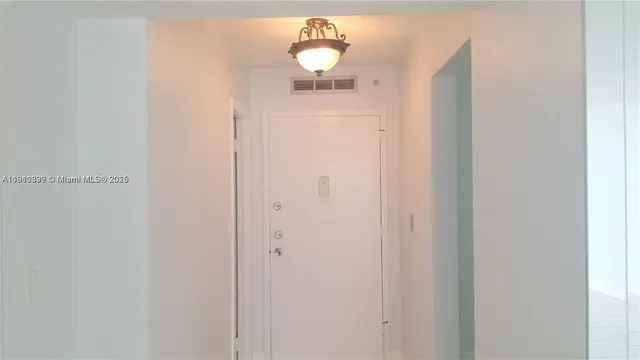 a view of a decorative light in a hallway