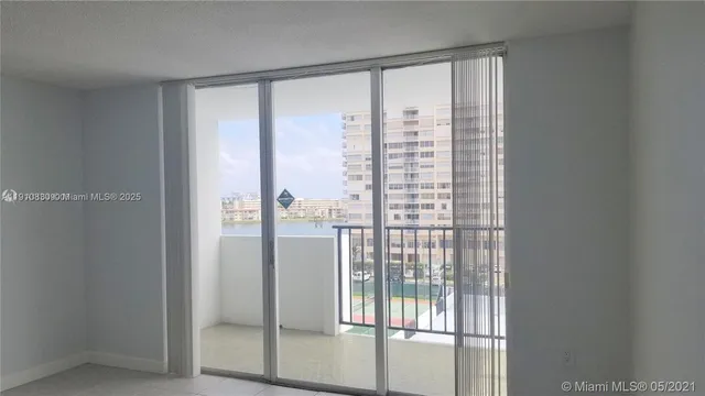 a view of a room that has a window