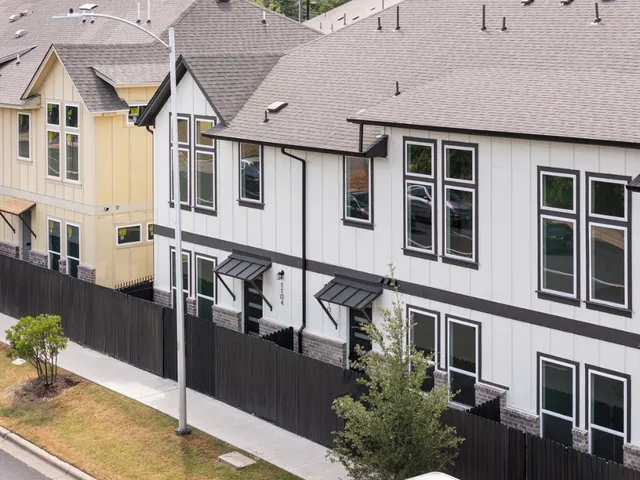 a view of a house with many windows