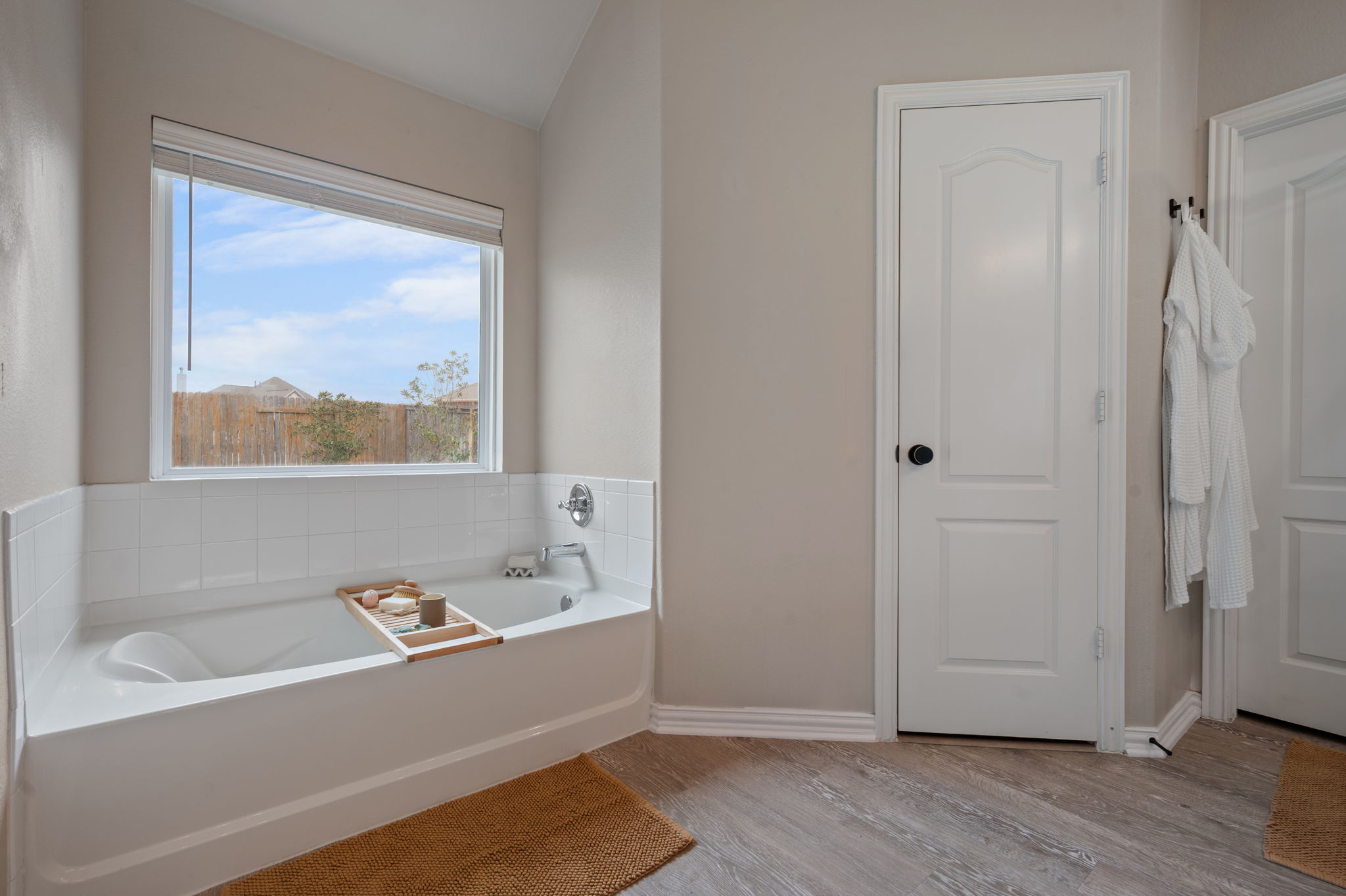 3724 Brean Down Road Pflugerville, TX 78660 - Photo 15 of 34 a view of bathroom with bathtub and shower