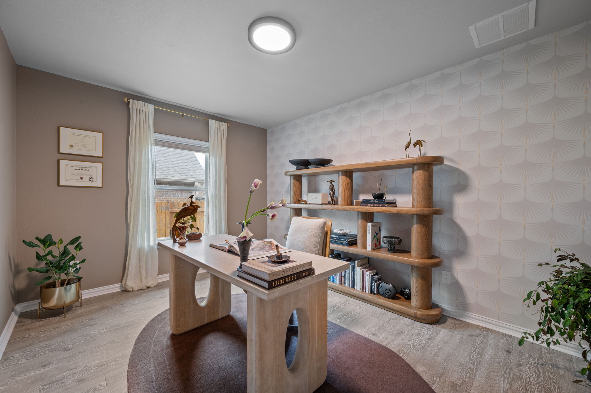 3724 Brean Down Road Pflugerville, TX 78660 - Photo 17 of 34 a living room with furniture and a potted plant