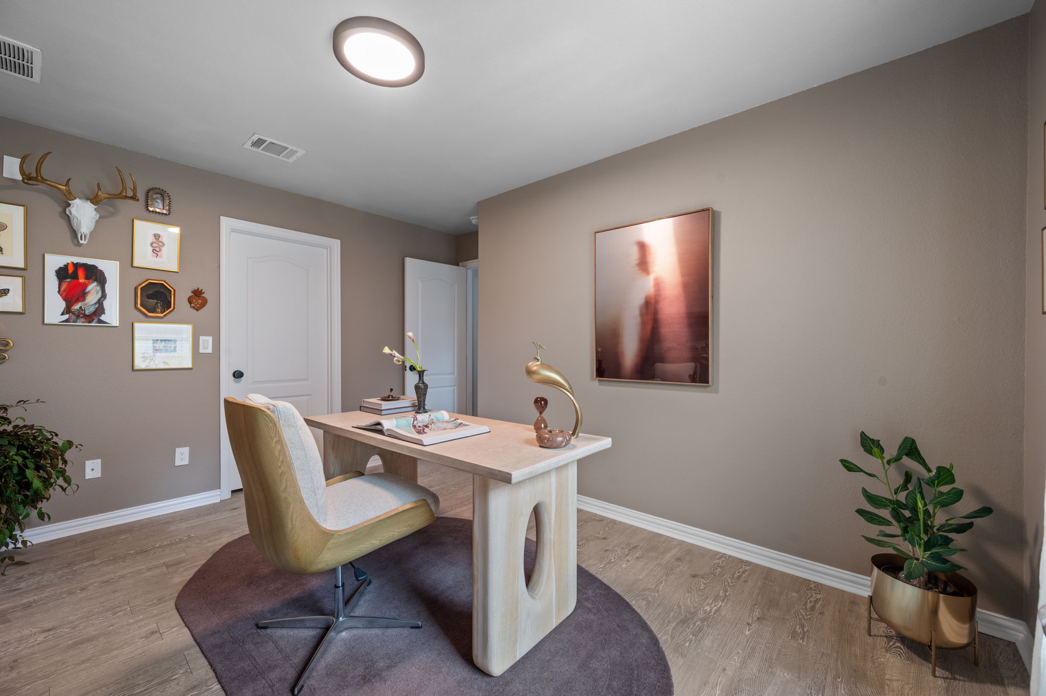 3724 Brean Down Road Pflugerville, TX 78660 - Photo 18 of 34 a dining room with furniture and a potted plant