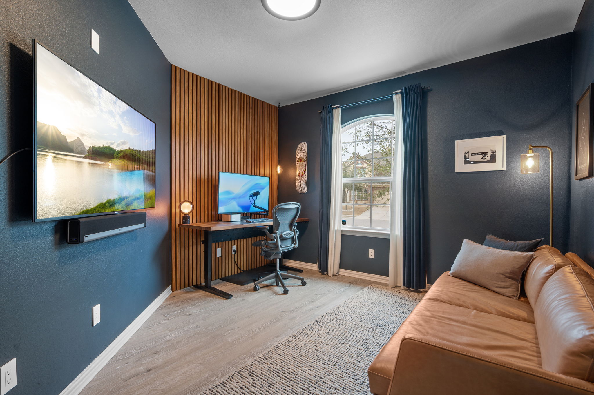 3724 Brean Down Road Pflugerville, TX 78660 - Photo 19 of 34 a bedroom with a bed and large windows