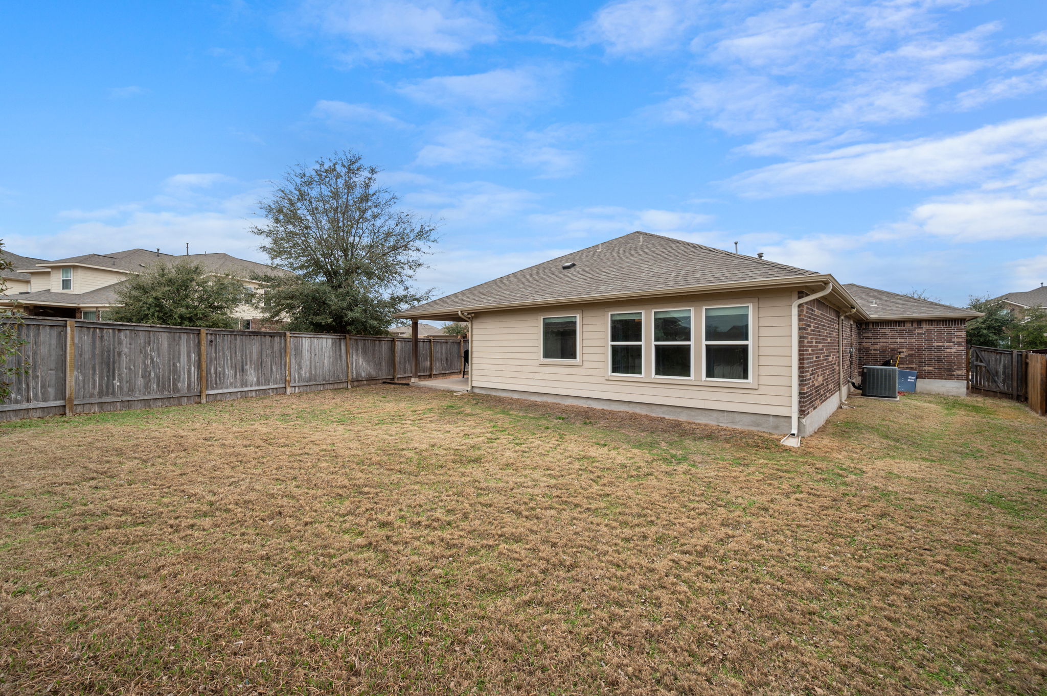 3724 Brean Down Road Pflugerville, TX 78660 - Photo 30 of 34 a front view of a house with a yard