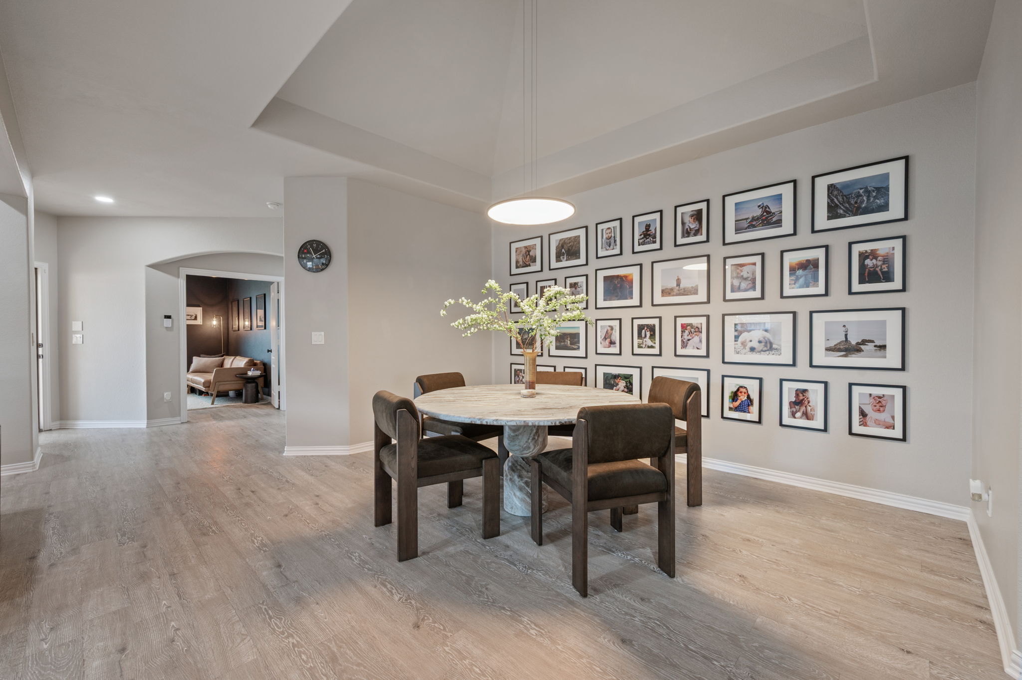 3724 Brean Down Road Pflugerville, TX 78660 - Photo 7 of 34 a view of a dining room with furniture and wooden floor