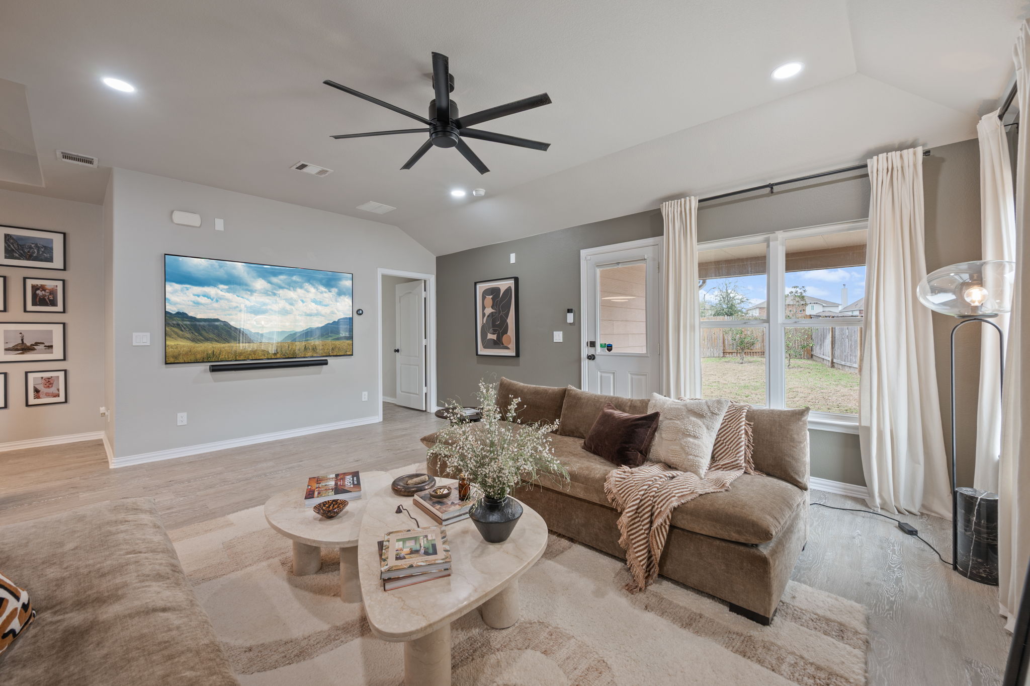 3724 Brean Down Road Pflugerville, TX 78660 - Photo 10 of 34 a living room with furniture and a large window