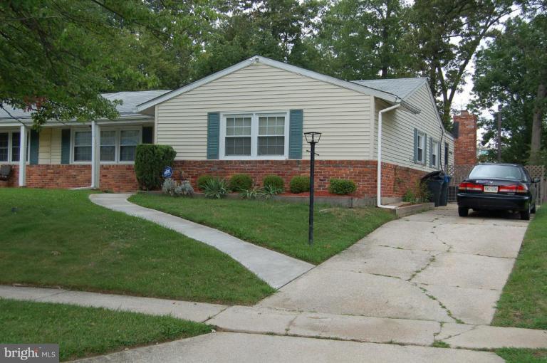 2016 Derrickson Road Windsor Mill, MD 21244 - Photo 1 of 11 a front view of a house with a yard and trees