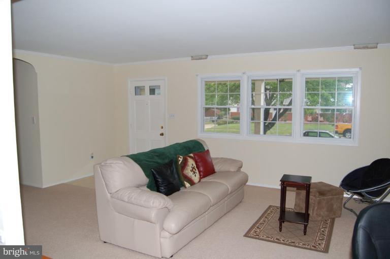 2016 Derrickson Road Windsor Mill, MD 21244 - Photo 4 of 11 a living room with furniture and a window