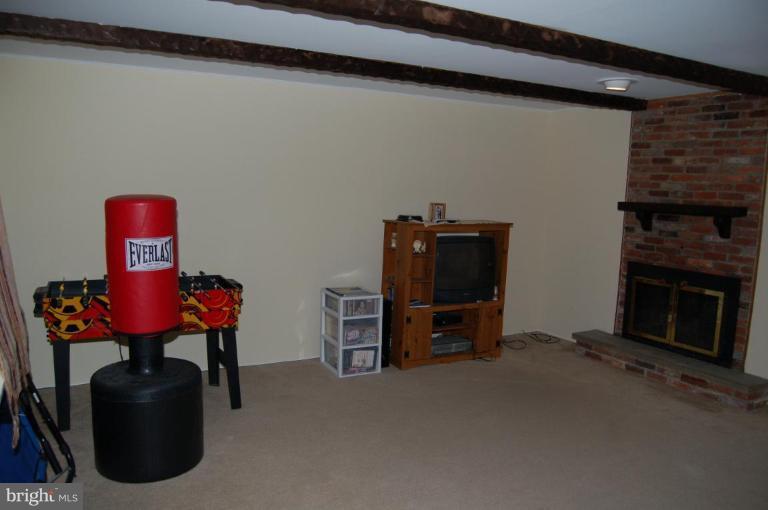 2016 Derrickson Road Windsor Mill, MD 21244 - Photo 8 of 11 a room with furniture and a fireplace
