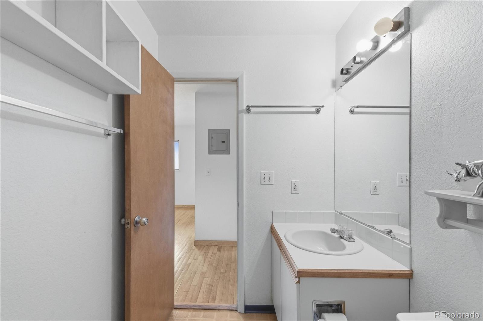 5510 Stonewall Place, Unit 24 Boulder, CO 80303 - Photo 21 of 30 a bathroom with a sink and a mirror