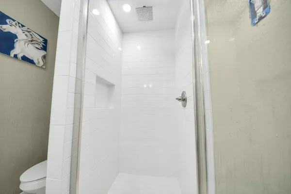 a bathroom with a sink double vanity and a mirror
