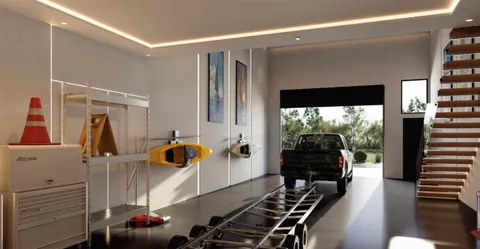 a living room with furniture a large window and potted plants