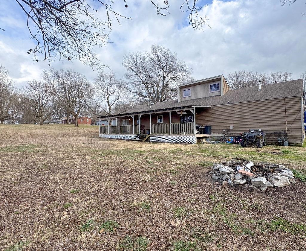 127 Walton Loop Covington, TN 38019 - Photo 38 of 40 a view of a house with a yard