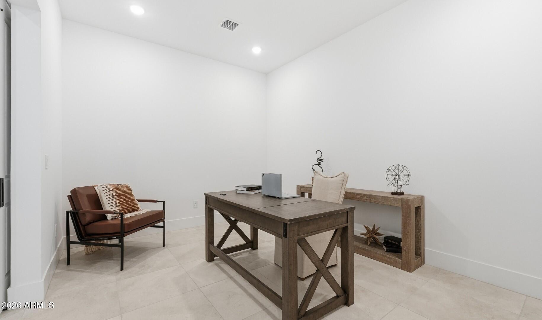 663 East Grayling Road San Tan Valley, AZ 85140 - Photo 11 of 31 a view of a workspace with furniture