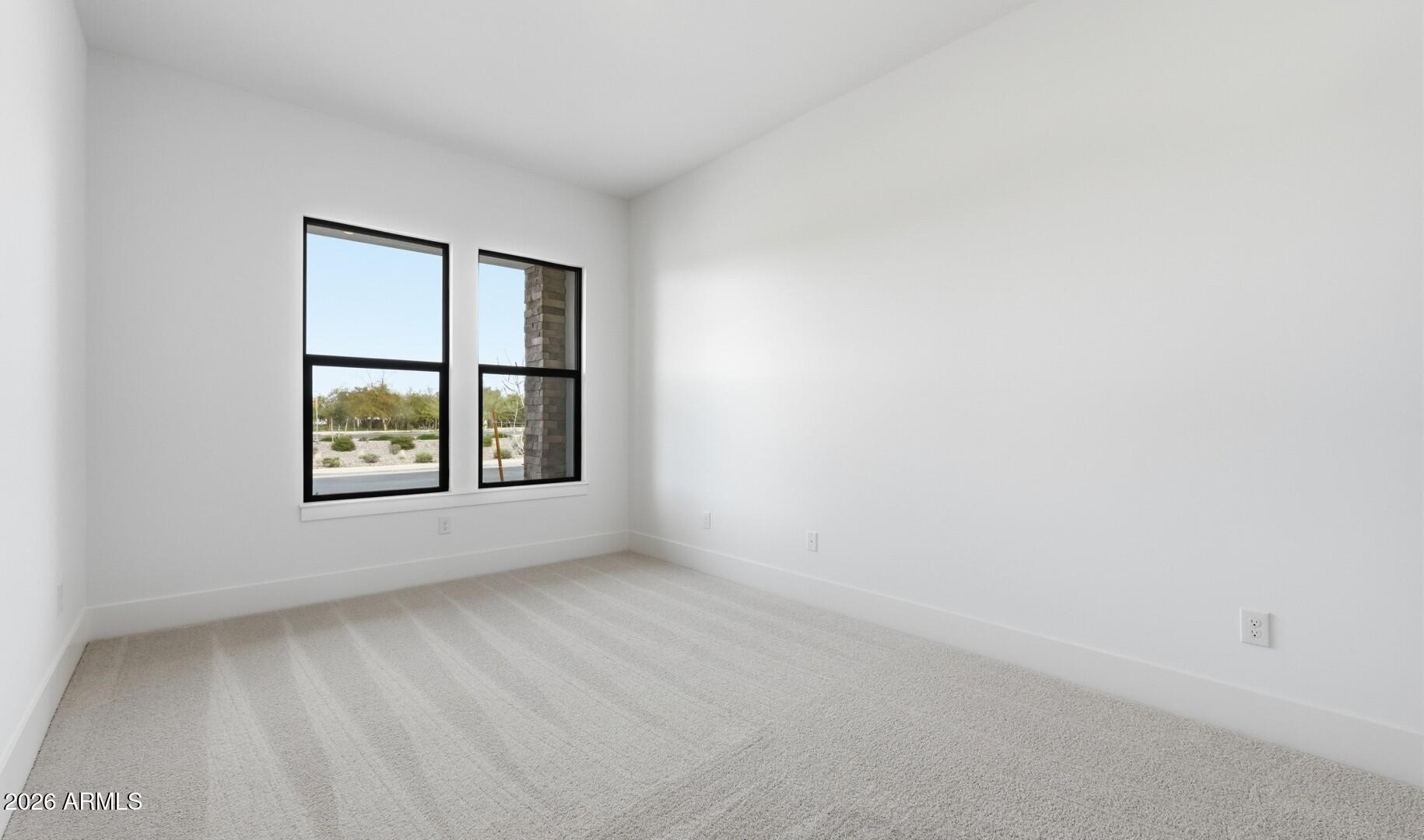 663 East Grayling Road San Tan Valley, AZ 85140 - Photo 14 of 31 an empty room with windows