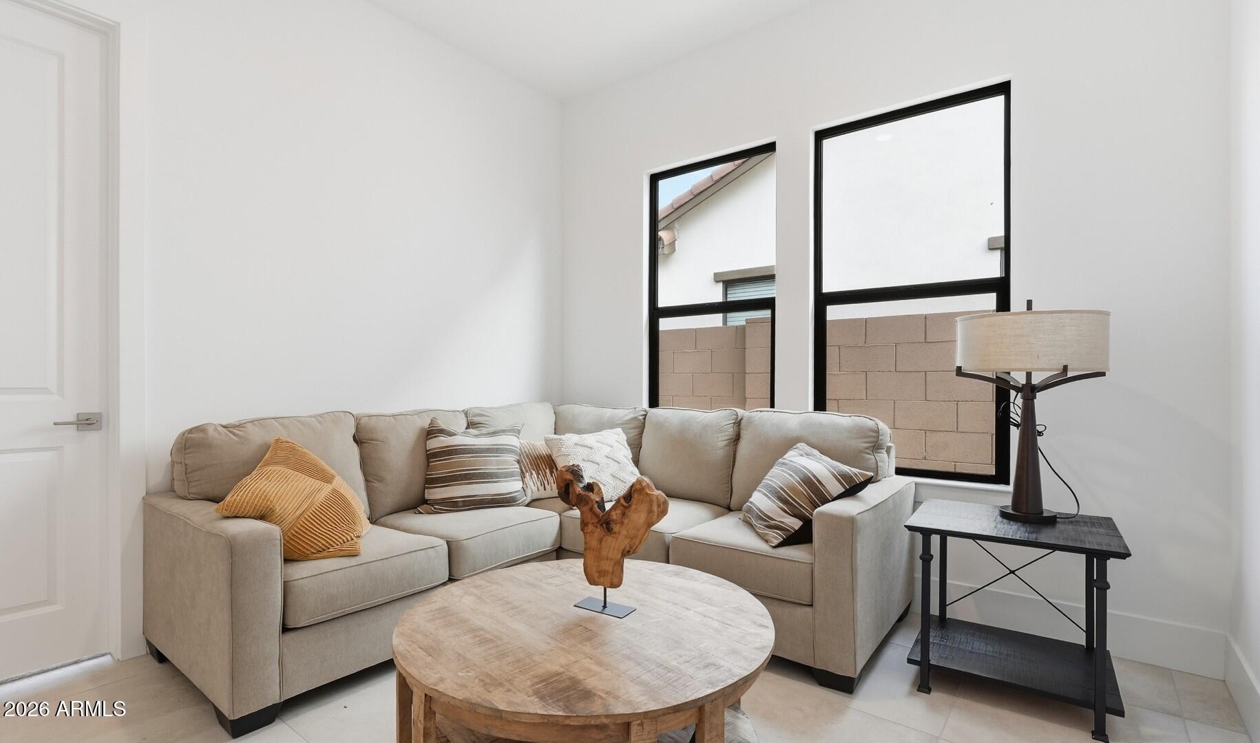 663 East Grayling Road San Tan Valley, AZ 85140 - Photo 18 of 31 a living room with furniture and a window