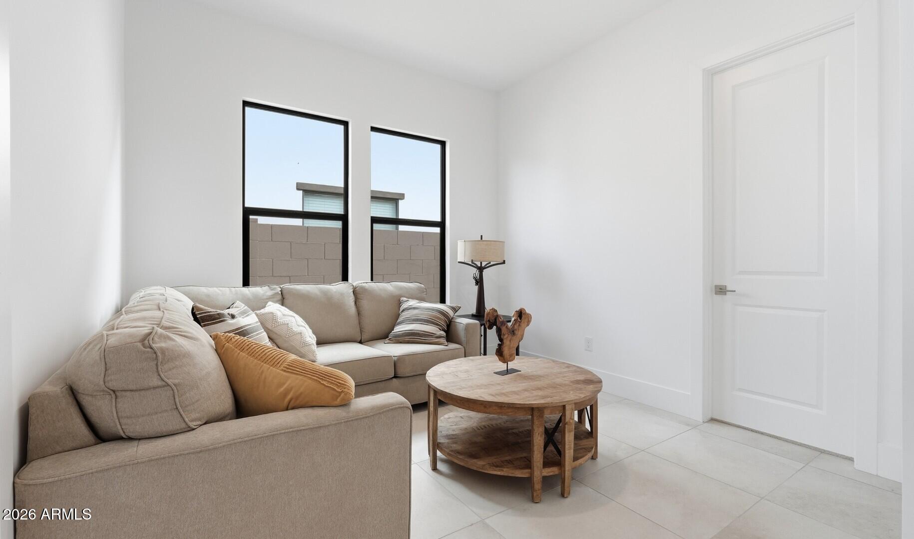 663 East Grayling Road San Tan Valley, AZ 85140 - Photo 19 of 31 a living room with furniture and a window
