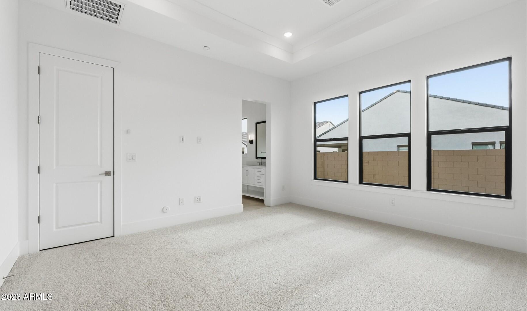 663 East Grayling Road San Tan Valley, AZ 85140 - Photo 22 of 31 an empty room with windows