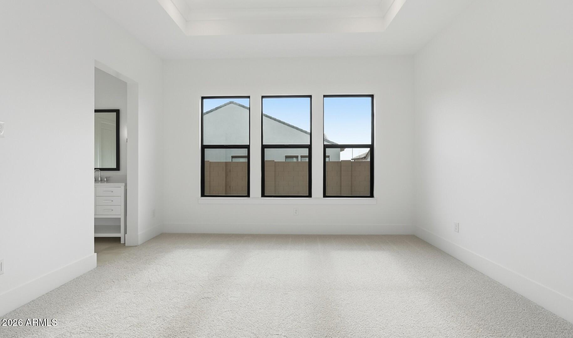 663 East Grayling Road San Tan Valley, AZ 85140 - Photo 23 of 31 an empty room with windows