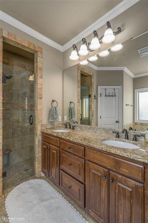 3034 Sagefield Lane Haughton, LA 71037 - Photo 15 of 28 a bathroom with a granite countertop sink mirror and double