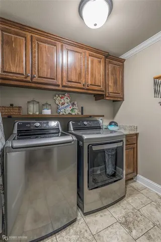 a stove top oven sitting inside of a kitchen