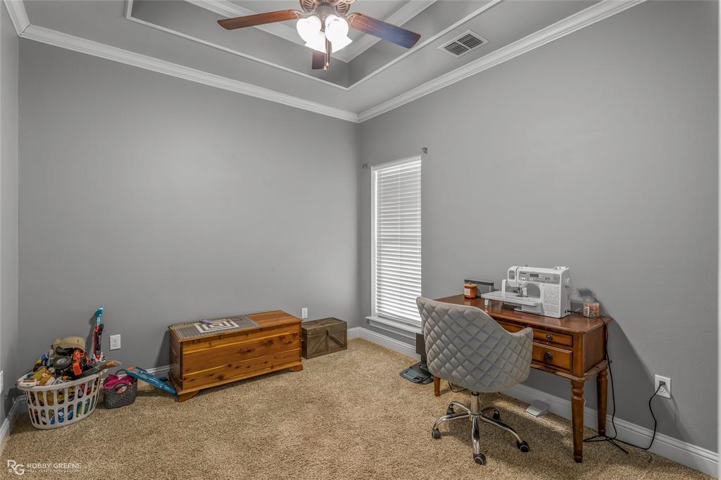 3034 Sagefield Lane Haughton, LA 71037 - Photo 18 of 28 a living room with furniture and a chandelier