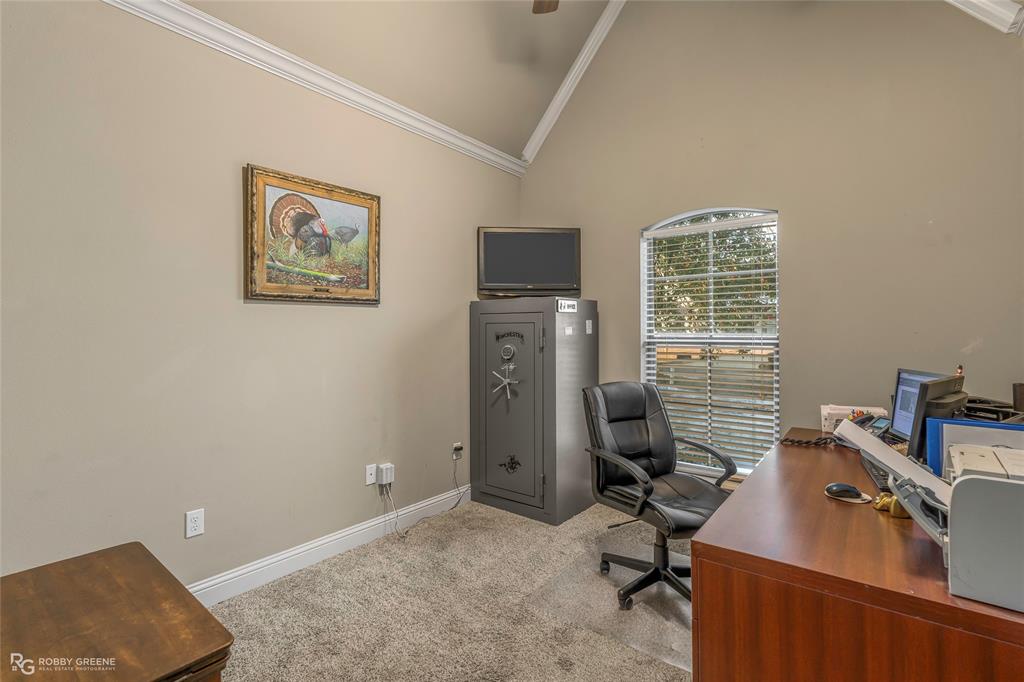 3034 Sagefield Lane Haughton, LA 71037 - Photo 20 of 28 a view of a workspace with furniture and a window