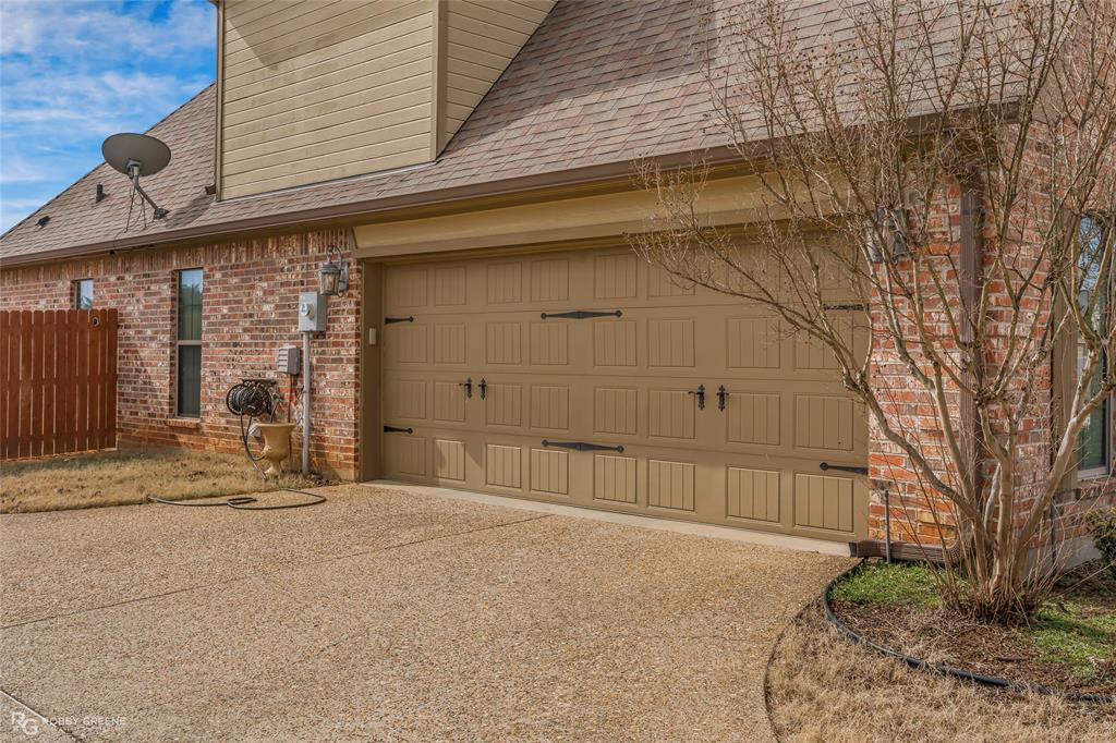 3034 Sagefield Lane Haughton, LA 71037 - Photo 25 of 28 a view of a house with a wooden fence