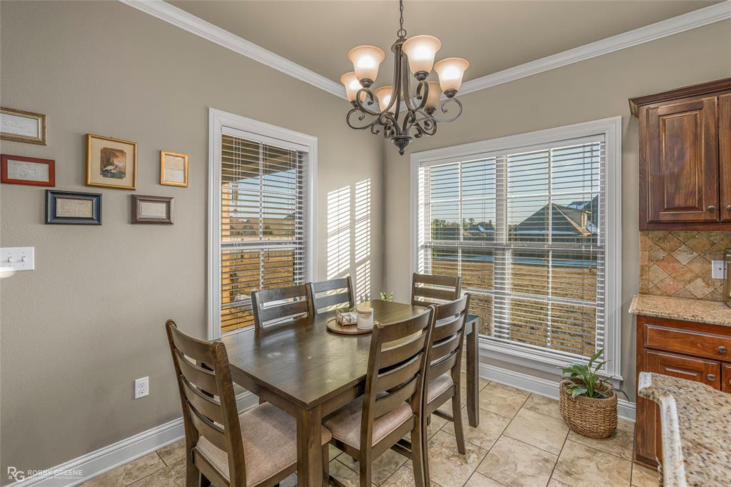 3034 Sagefield Lane Haughton, LA 71037 - Photo 8 of 28 a view of a dining room with furniture window and outside view