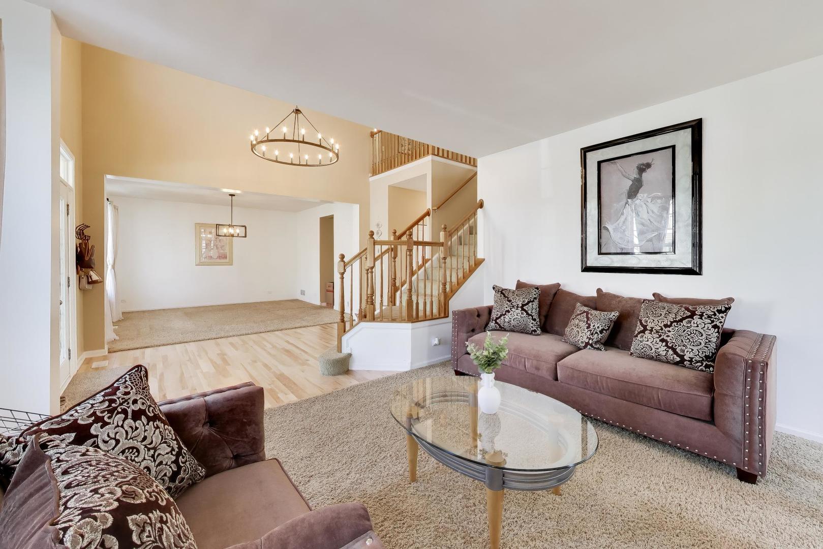343 Copper Springs Lane Elgin, IL 60124 - Photo 13 of 50 a living room with furniture and a potted plant