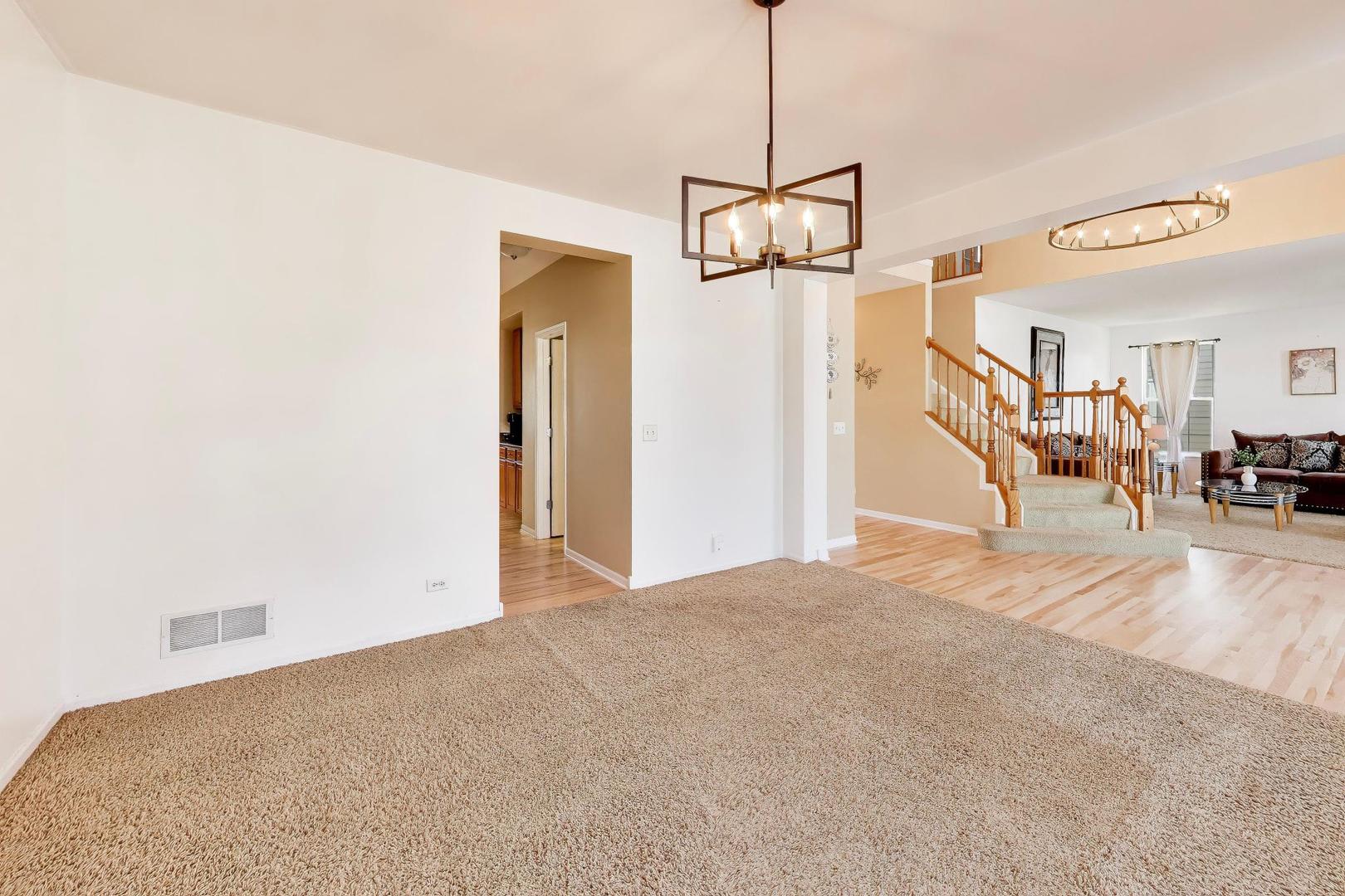 343 Copper Springs Lane Elgin, IL 60124 - Photo 14 of 50 a view of empty room with wooden floor