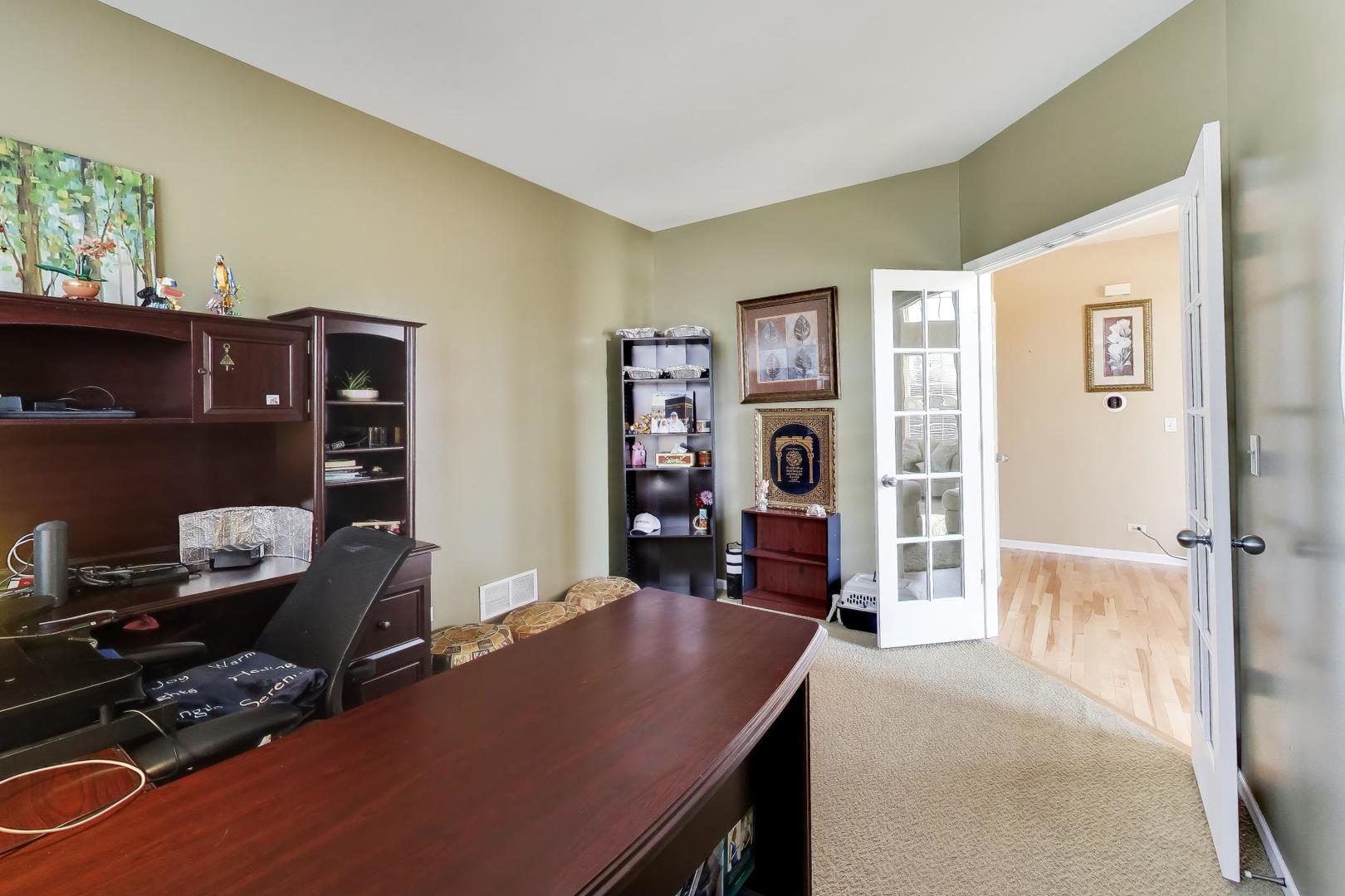 343 Copper Springs Lane Elgin, IL 60124 - Photo 15 of 50 a bedroom with a bed and furniture