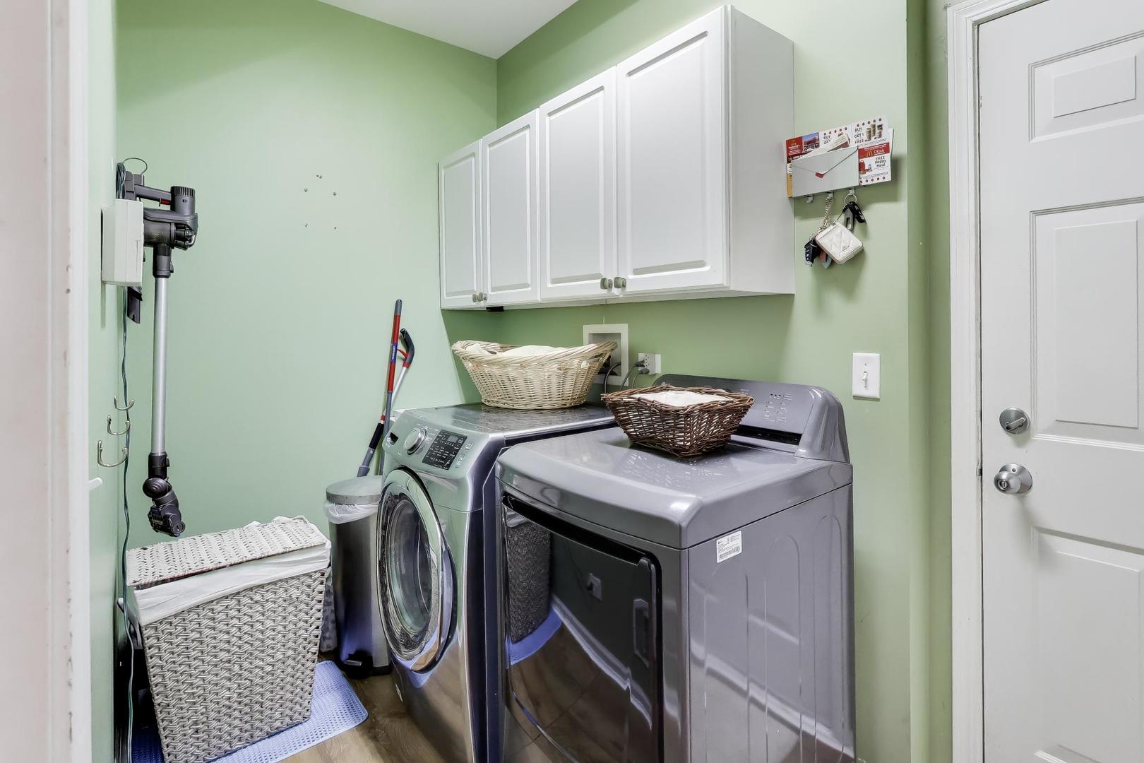 343 Copper Springs Lane Elgin, IL 60124 - Photo 18 of 50 a utility room with dryer and washer