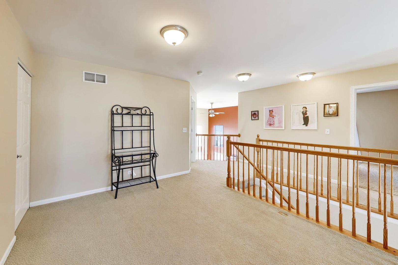 343 Copper Springs Lane Elgin, IL 60124 - Photo 20 of 50 a view of a hallway with workspace