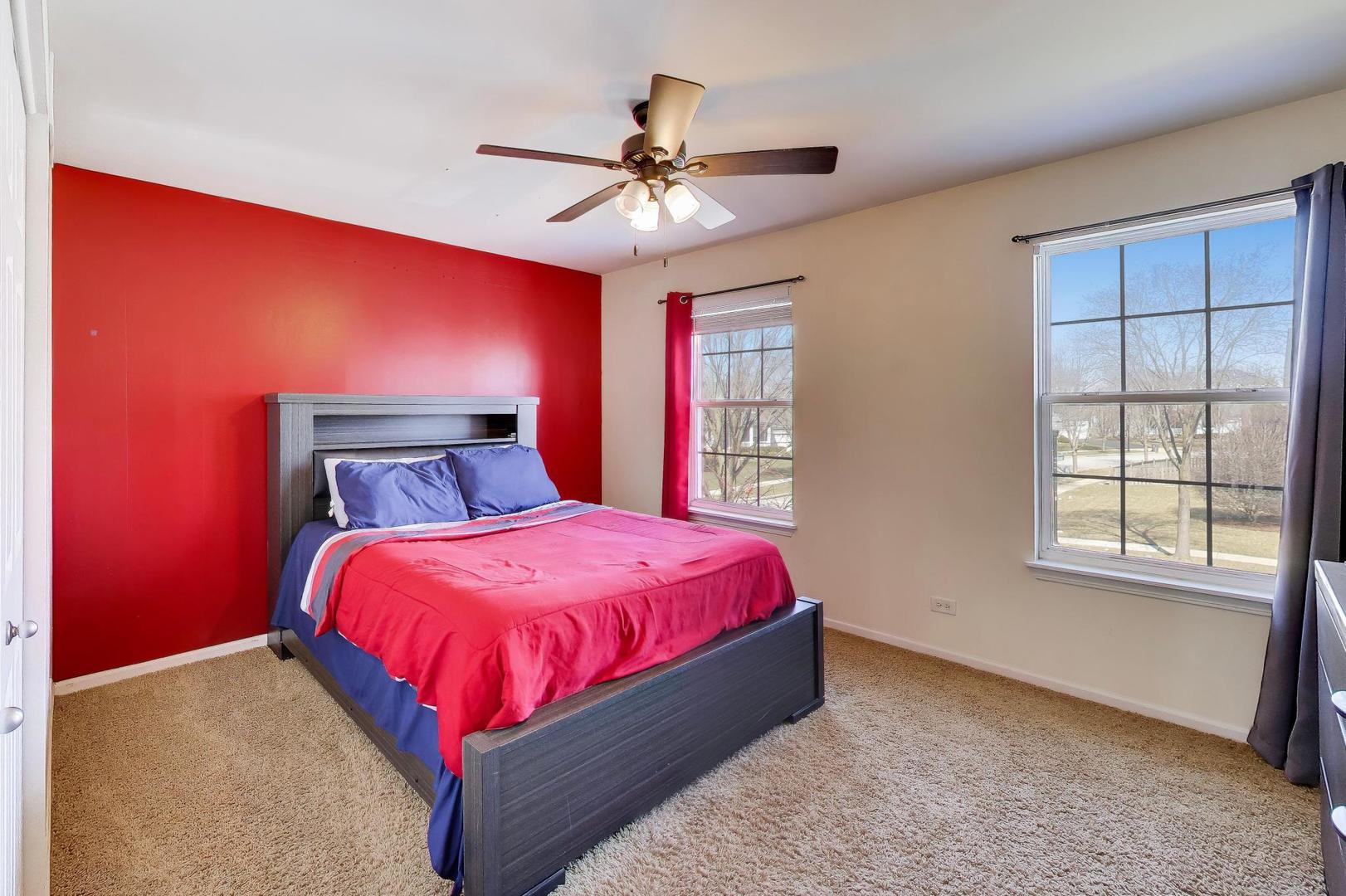 343 Copper Springs Lane Elgin, IL 60124 - Photo 26 of 50 a bedroom with a bed and window