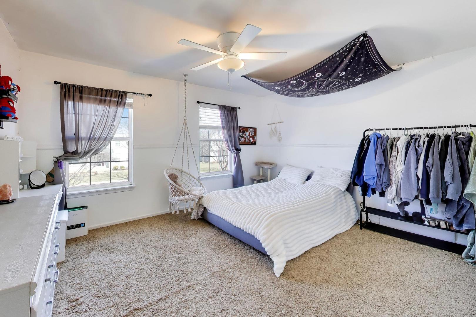 343 Copper Springs Lane Elgin, IL 60124 - Photo 27 of 50 a bedroom with a bed and a window