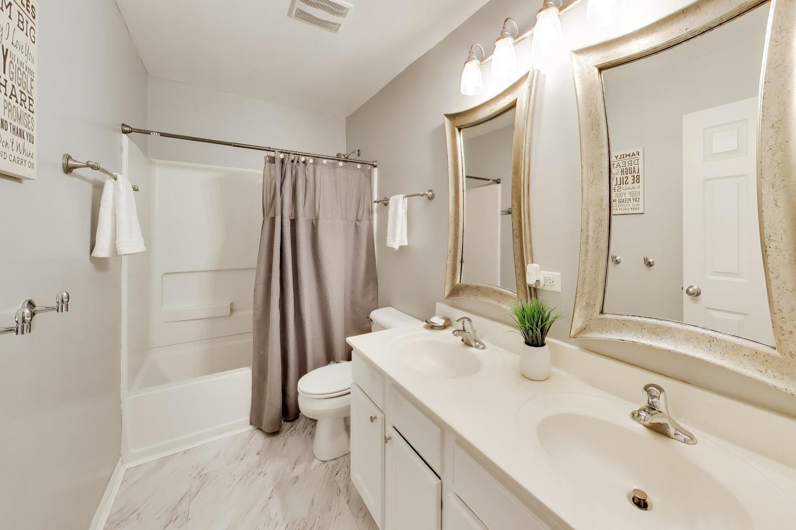 343 Copper Springs Lane Elgin, IL 60124 - Photo 28 of 50 a bathroom with a sink toilet and shower