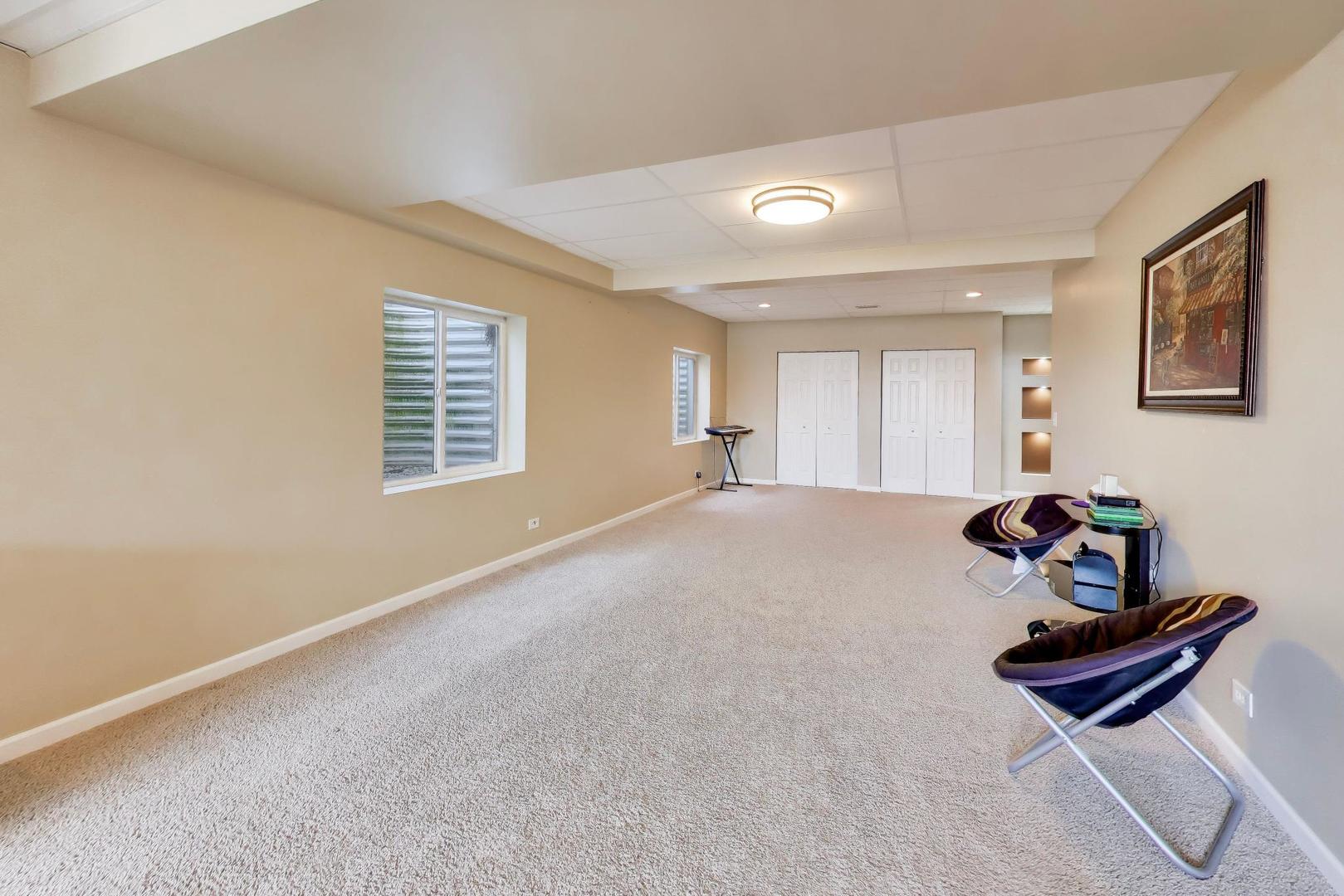 343 Copper Springs Lane Elgin, IL 60124 - Photo 32 of 50 a room with furniture and windows