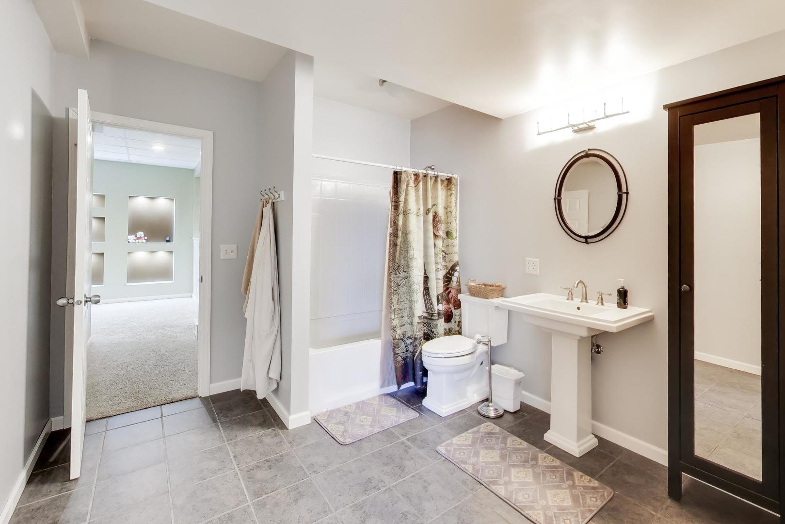 343 Copper Springs Lane Elgin, IL 60124 - Photo 36 of 50 a bathroom with a sink toilet and shower