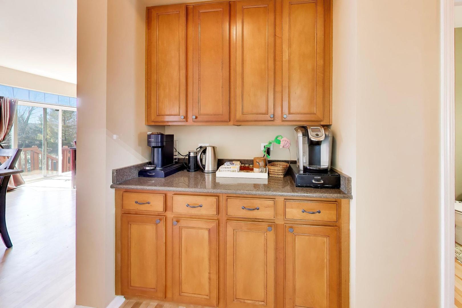 343 Copper Springs Lane Elgin, IL 60124 - Photo 7 of 50 a kitchen with granite countertop a sink window and cabinets