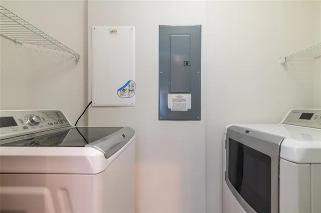 a utility room with dryer and washer